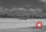 Image of Consolidated B-24 Liberator bombers landing Angaur Palau Islands, 1944, second 58 stock footage video 65675080435
