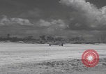 Image of Consolidated B-24 Liberator bombers landing Angaur Palau Islands, 1944, second 59 stock footage video 65675080435