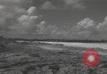 Image of Consolidated B-24 Liberator bombers landing Angaur Palau Islands, 1944, second 62 stock footage video 65675080435
