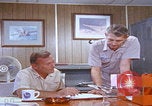 Image of NAS Miramar mechanics San Diego California USA, 1974, second 7 stock footage video 65675080441