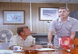 Image of NAS Miramar mechanics San Diego California USA, 1974, second 9 stock footage video 65675080441