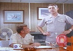 Image of NAS Miramar mechanics San Diego California USA, 1974, second 12 stock footage video 65675080441
