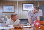 Image of NAS Miramar mechanics San Diego California USA, 1974, second 18 stock footage video 65675080441