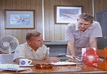 Image of NAS Miramar mechanics San Diego California USA, 1974, second 19 stock footage video 65675080441