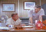 Image of NAS Miramar mechanics San Diego California USA, 1974, second 20 stock footage video 65675080441