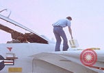 Image of NAS Miramar mechanics San Diego California USA, 1974, second 40 stock footage video 65675080441