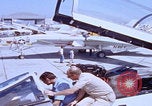 Image of NAS Miramar mechanics San Diego California USA, 1974, second 47 stock footage video 65675080441