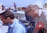 Image of NAS Miramar mechanics San Diego California USA, 1974, second 52 stock footage video 65675080441