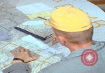 Image of plotting on map Da Nang Vietnam, 1966, second 3 stock footage video 65675080458