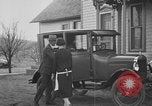 Image of Family with Model T car United States USA, 1926, second 11 stock footage video 65675080470