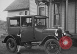 Image of Family with Model T car United States USA, 1926, second 16 stock footage video 65675080470