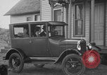Image of Family with Model T car United States USA, 1926, second 23 stock footage video 65675080470