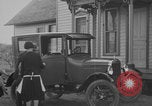 Image of Family with Model T car United States USA, 1926, second 32 stock footage video 65675080470
