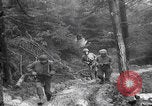 Image of US soldiers marching Merode Germany, 1944, second 23 stock footage video 65675080479