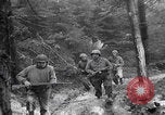 Image of US soldiers marching Merode Germany, 1944, second 27 stock footage video 65675080479