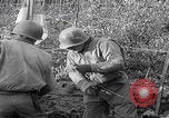 Image of US soldiers marching Merode Germany, 1944, second 55 stock footage video 65675080479