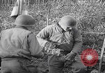 Image of US soldiers marching Merode Germany, 1944, second 59 stock footage video 65675080479