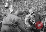 Image of US soldiers marching Merode Germany, 1944, second 60 stock footage video 65675080479