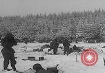 Image of 101st Airborne soldier foxholes Bastogne Belgium, 1945, second 6 stock footage video 65675080484