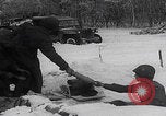 Image of 101st Airborne soldier foxholes Bastogne Belgium, 1945, second 25 stock footage video 65675080484