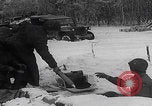 Image of 101st Airborne soldier foxholes Bastogne Belgium, 1945, second 26 stock footage video 65675080484