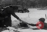 Image of 101st Airborne soldier foxholes Bastogne Belgium, 1945, second 28 stock footage video 65675080484