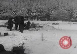 Image of 101st Airborne soldier foxholes Bastogne Belgium, 1945, second 38 stock footage video 65675080484