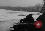 Image of 101st Airborne soldier foxholes Bastogne Belgium, 1945, second 52 stock footage video 65675080484