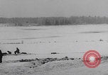 Image of 101st Airborne soldier foxholes Bastogne Belgium, 1945, second 56 stock footage video 65675080484
