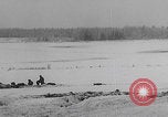 Image of 101st Airborne soldier foxholes Bastogne Belgium, 1945, second 58 stock footage video 65675080484