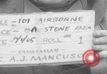 Image of 101st Airborne marching in snow Bastogne Belgium, 1945, second 3 stock footage video 65675080486