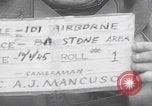 Image of 101st Airborne marching in snow Bastogne Belgium, 1945, second 4 stock footage video 65675080486