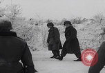 Image of 101st Airborne marching in snow Bastogne Belgium, 1945, second 21 stock footage video 65675080486