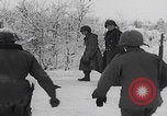 Image of 101st Airborne marching in snow Bastogne Belgium, 1945, second 22 stock footage video 65675080486