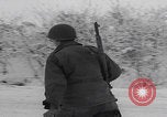 Image of 101st Airborne marching in snow Bastogne Belgium, 1945, second 29 stock footage video 65675080486
