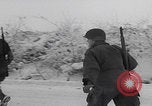 Image of 101st Airborne marching in snow Bastogne Belgium, 1945, second 30 stock footage video 65675080486