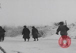 Image of 101st Airborne marching in snow Bastogne Belgium, 1945, second 33 stock footage video 65675080486