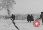 Image of 101st Airborne marching in snow Bastogne Belgium, 1945, second 34 stock footage video 65675080486