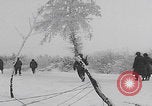 Image of 101st Airborne marching in snow Bastogne Belgium, 1945, second 35 stock footage video 65675080486