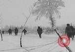 Image of 101st Airborne marching in snow Bastogne Belgium, 1945, second 38 stock footage video 65675080486