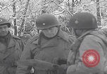 Image of 101st Airborne marching in snow Bastogne Belgium, 1945, second 40 stock footage video 65675080486