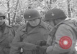 Image of 101st Airborne marching in snow Bastogne Belgium, 1945, second 41 stock footage video 65675080486