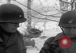 Image of 101st Airborne marching in snow Bastogne Belgium, 1945, second 48 stock footage video 65675080486