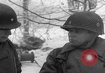 Image of 101st Airborne marching in snow Bastogne Belgium, 1945, second 50 stock footage video 65675080486