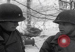 Image of 101st Airborne marching in snow Bastogne Belgium, 1945, second 52 stock footage video 65675080486
