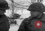 Image of 101st Airborne marching in snow Bastogne Belgium, 1945, second 53 stock footage video 65675080486