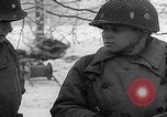 Image of 101st Airborne marching in snow Bastogne Belgium, 1945, second 54 stock footage video 65675080486