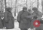 Image of 101st Airborne marching in snow Bastogne Belgium, 1945, second 55 stock footage video 65675080486