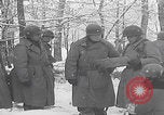 Image of 101st Airborne marching in snow Bastogne Belgium, 1945, second 56 stock footage video 65675080486