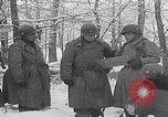 Image of 101st Airborne marching in snow Bastogne Belgium, 1945, second 60 stock footage video 65675080486